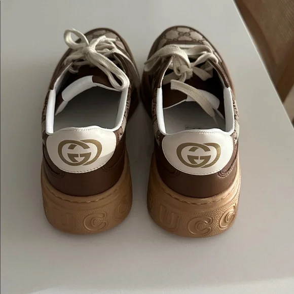 Gucci women’s Tan and Brown Logo Sneakers- never worn!